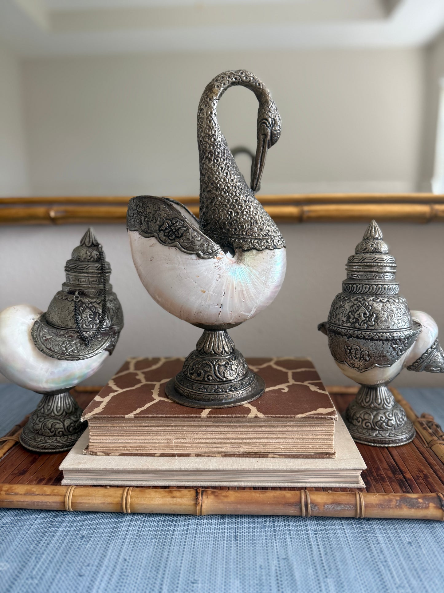 Antique Anglo Indian silver nautilus swan and shell set.