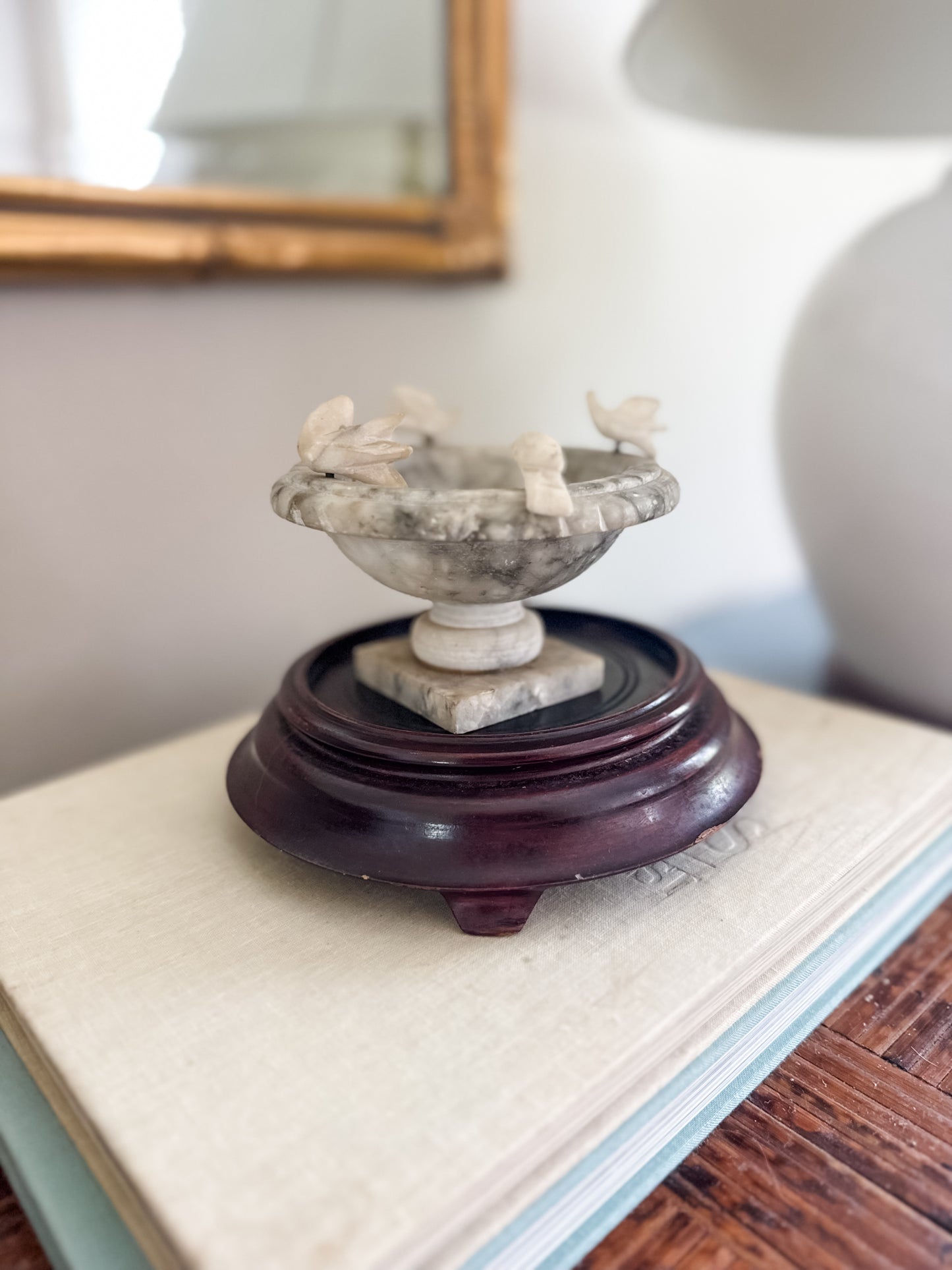 Vintage alabaster bird bath in cloche